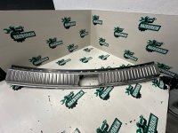 Кожух замка багажника